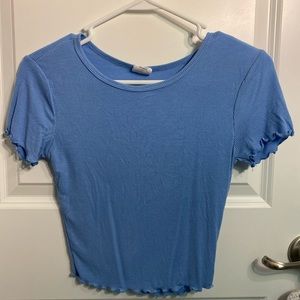 A blue shirt from Tillys